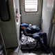 A makeshift bed of baggage on a train from Shanghai to Shijiazhuang.